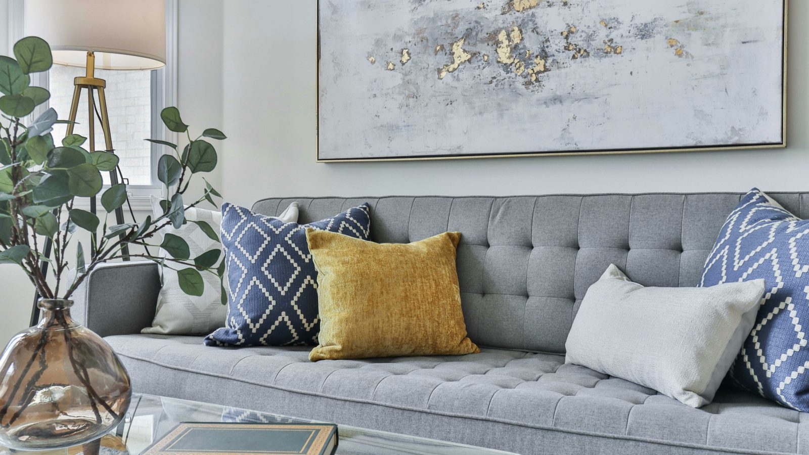 white and gray floral sofa