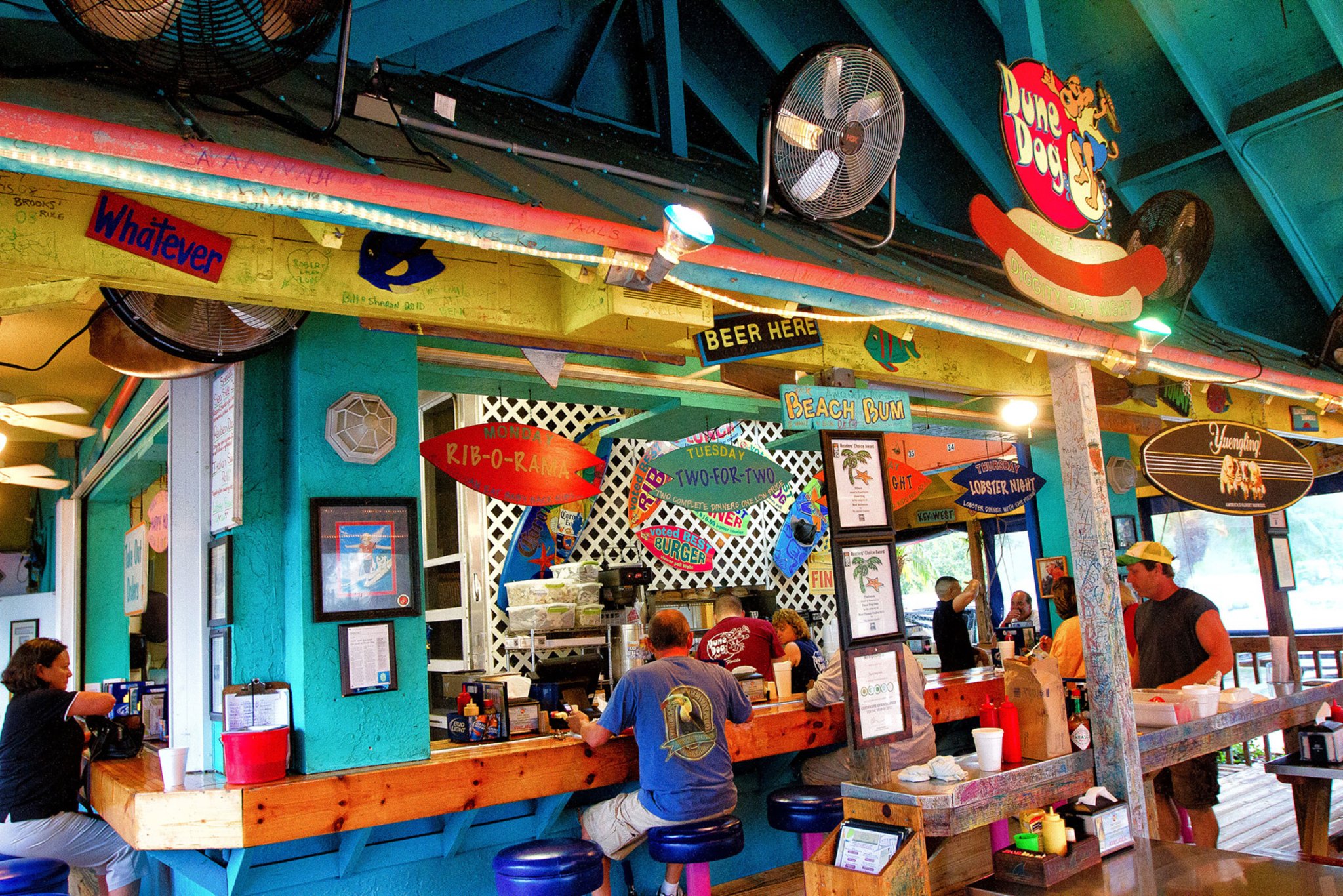 a bar with a blue roof and a blue ceiling at The Swifty Skills Session